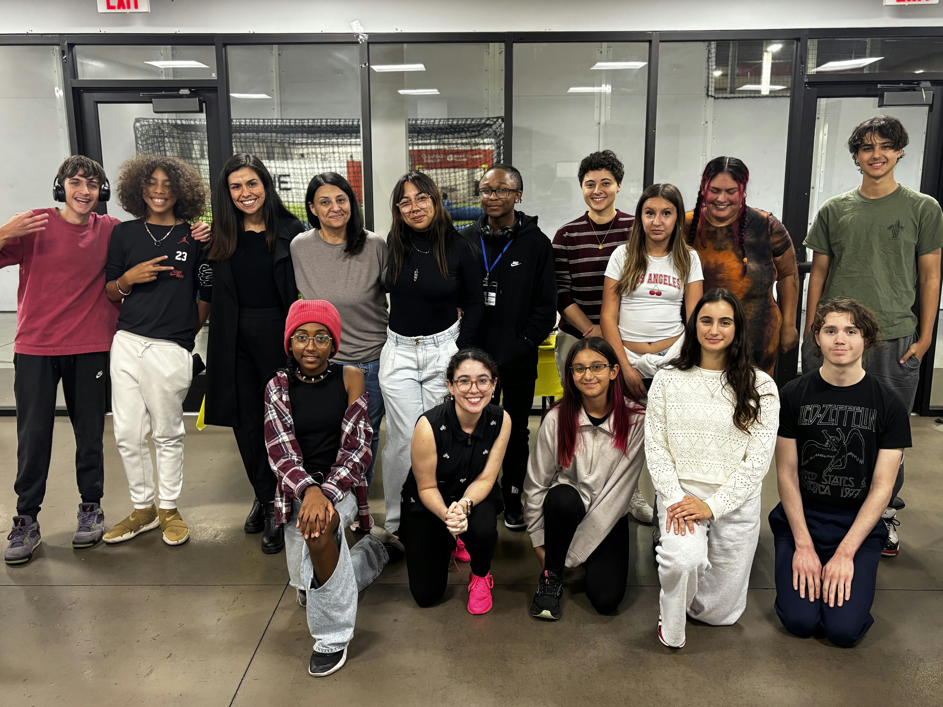 Teens and mentors gathered together at a Rebuild Yourself community night